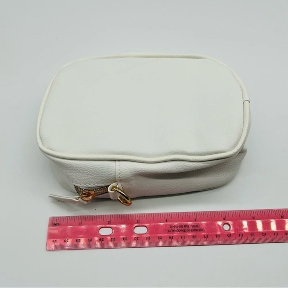STILA white cosmetic crossbody bag